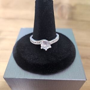 23. 925 Sterling Silver AAA CZ Ring.